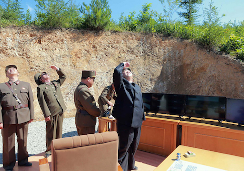North Korean leader Kim Jong-Un inspects the successful test-fire of the intercontinental ballistic missile Hwasong-14 at an undisclosed location