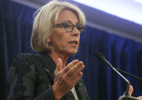 Education Secretary Betsy DeVos speaks at the Magnet Schools Of America Conference on February 15, 2017 in Washington, DC. DeVos addressed a recent protest at a public school she visited in Washington, DC last week following her controversial nomination to the post by President Donald Trump. / Getty Images