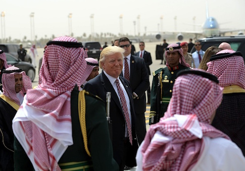 President Donald Trump makes his way to board Air Force One in Riyadh