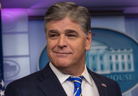Fox News host Sean Hannity is seen in the White House briefing room in Washington, DC, on January 24, 2017. / Getty Images