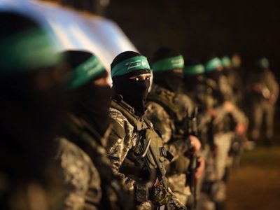 Palestinian members of the Ezzedine al-Qassam Brigades, the armed wing of the Hamas movement
