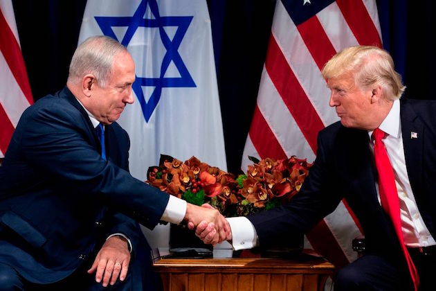 Israel's Prime Minister Benjamin Netanyahu and President Donald Trump shake hands