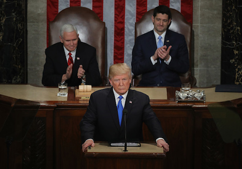 President Donald J. Trump delivers the State of the Union address as U.S. Vice President Mike Pence and Speaker of the House Paul Ryan look on