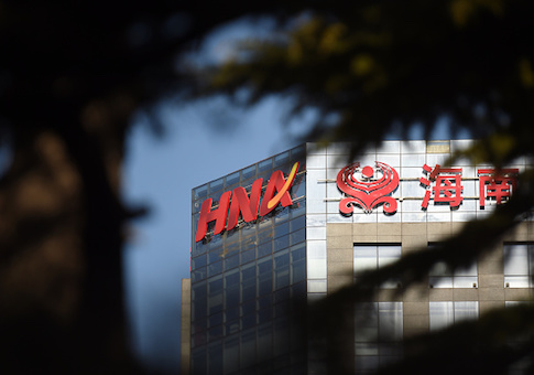 The HNA logo is seen on a building in Beijing