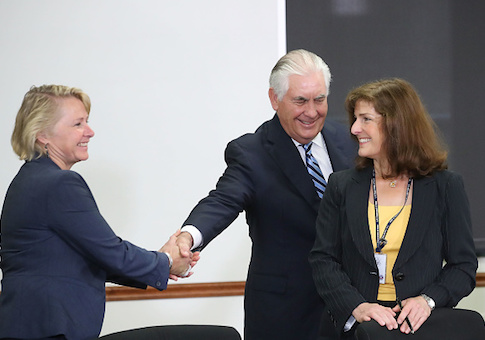 Secretary of State Rex Tillerson shakes hands with Susan Thornton