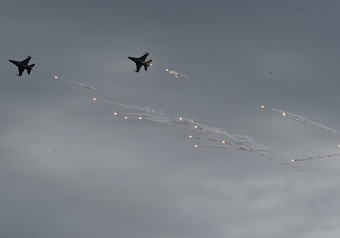 Two F-16 Fighting Falcon launch flares during an annual drill at a Air Base in Taitung City