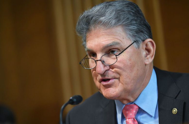 Manchin hints at third-party run, confident of victory.