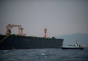 A British Police ship patrols near supertanker Grace 1 off the coast of Gibraltar