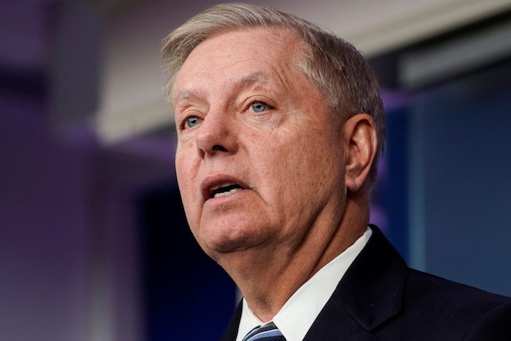 FILE PHOTO: Senator Lindsey Graham (R-SC) speaks after U.S. President Donald Trump announced that the Islamic State leader Abu Bakr al-Baghdadi was believed to have been killed in a U.S. military operation inWashington