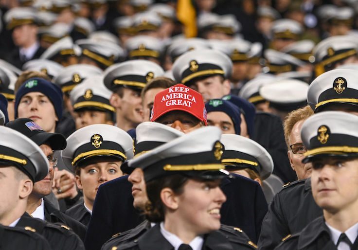 US President Donald Trump watches the game with members of the Navy during the Army-Navy football game in Philadelphia, Pennsylvania on December 14, 2019. (Photo by Andrew CABALLERO-REYNOLDS / AFP) (Photo by ANDREW CABALLERO-REYNOLDS/AFP via Getty Images)