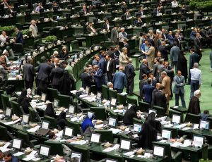 Iranian lawmakers attend a session of parliament in Tehran