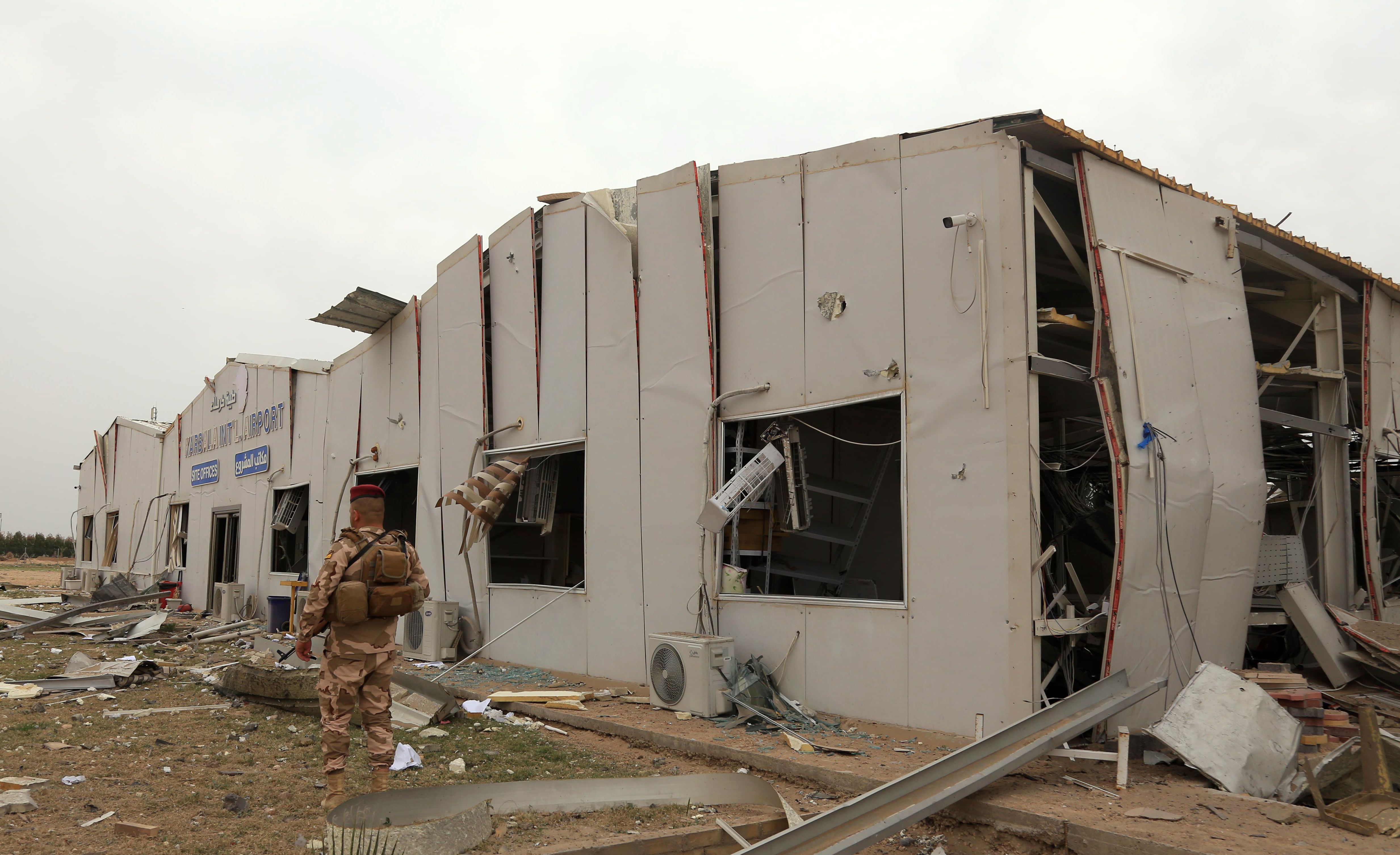 Destruction at Karbala airport in the Iraqi shrine city, targeted by US military air strikes against a pro-Iranian group in Iraq following the deaths of two Americans and a Briton