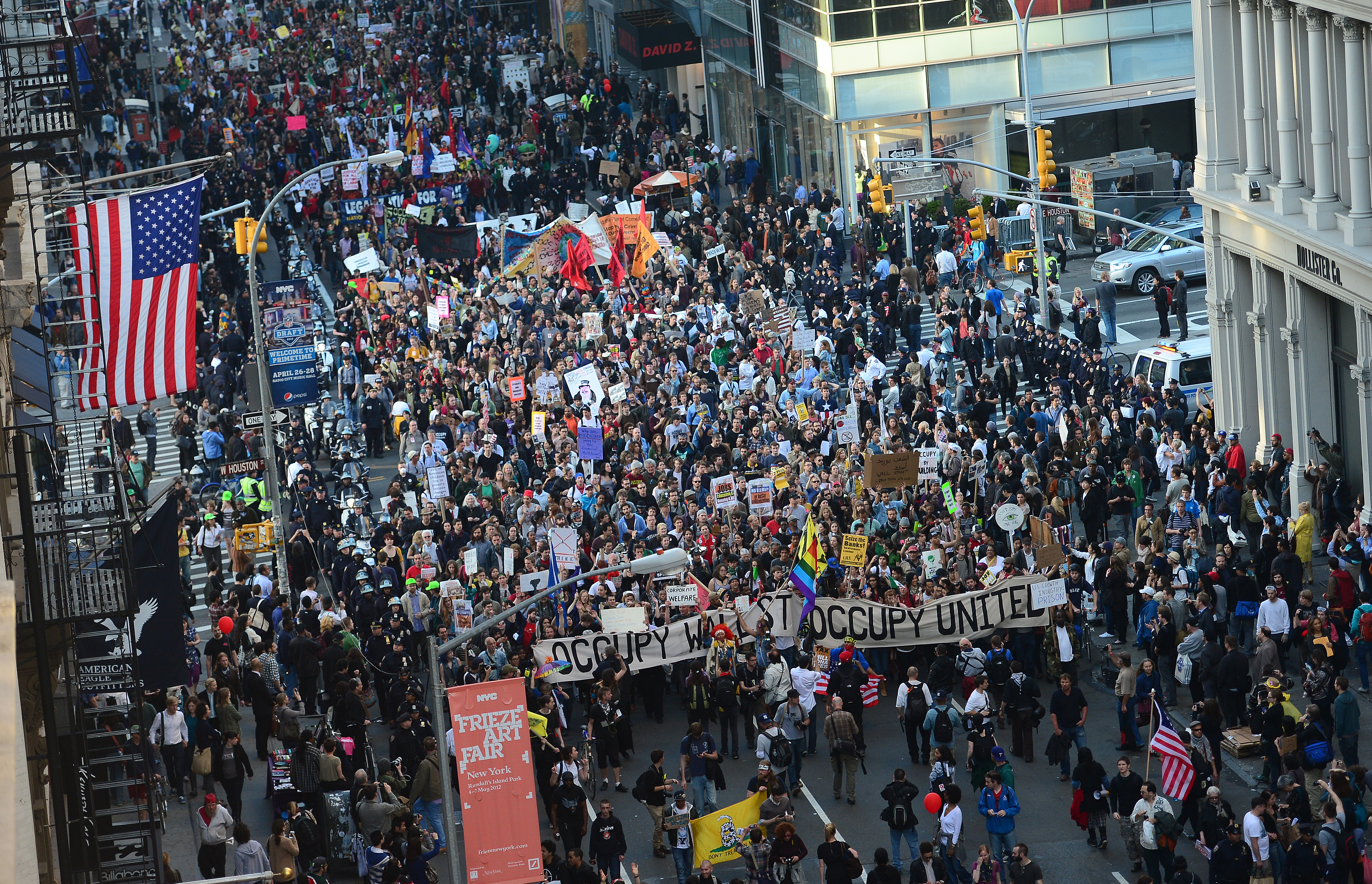 Occupy Wall Street participants stage a march down Broadway
