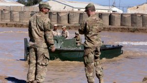 U.S. army forces supervise during a training session at the Taji camp, north of Baghdad in 2017