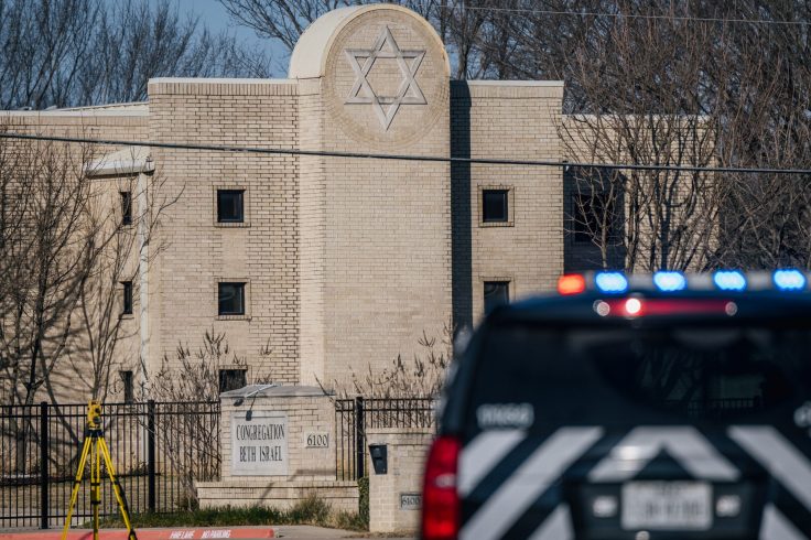 A law enforcement vehicle sits in front of the Congregation Beth Israel synagogue on January 16, 2022 in Colleyville, Texas