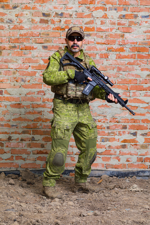 Ukrrainian soldier with a machine gun