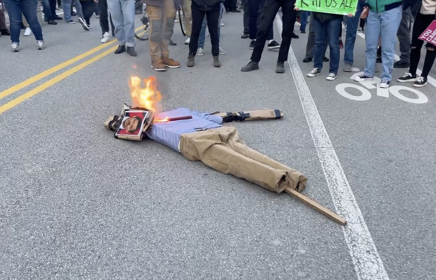 'This Was a Riot': Protesters Detonate Smoke Bomb, Burn Effigy at ...