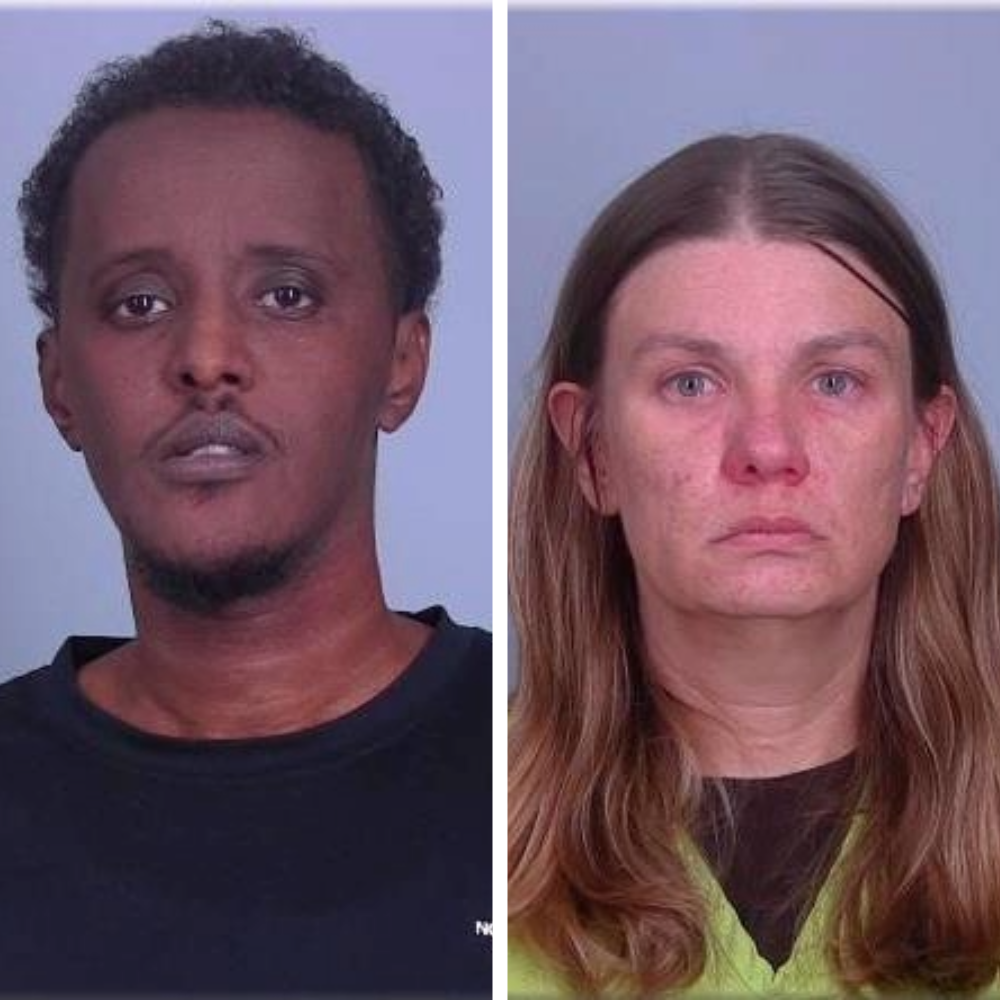 Salim Said (L.) and Aimee Brock (R.) stand for mugshots.